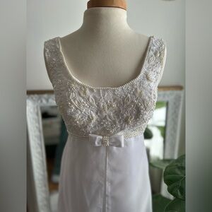Vintage white wedding dress with long train